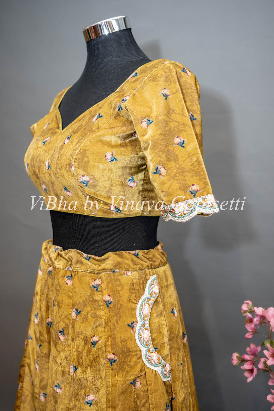 Yellowish Mehendi Green Embroidered Velvet Lehenga Set