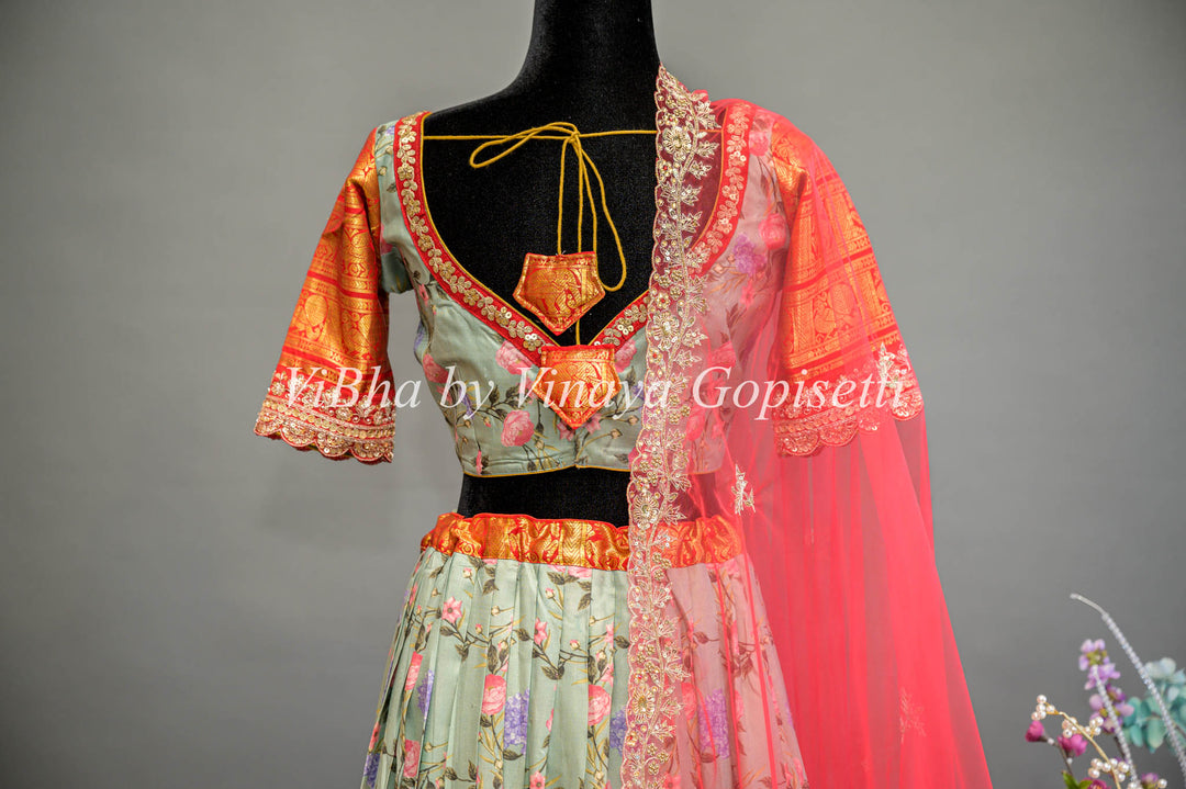Light Green Floral Kanchi Silk Lehenga With Embroidered Borders And Red Net Embroidered Dupatta