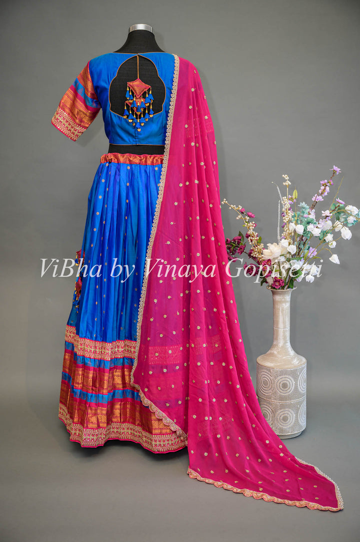 Royal Blue and Pink Gadwal Silk Lehenga with Embroidered Borders And Rani Pink Embroidered Dupatta