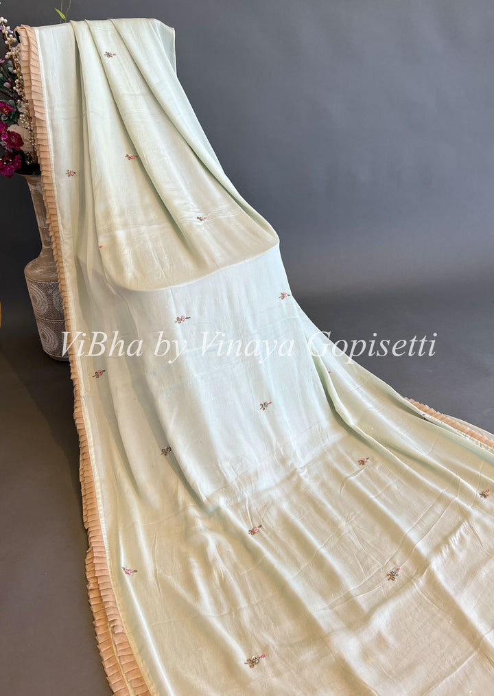 Pista Green Crepe Saree With Beige Blouse
