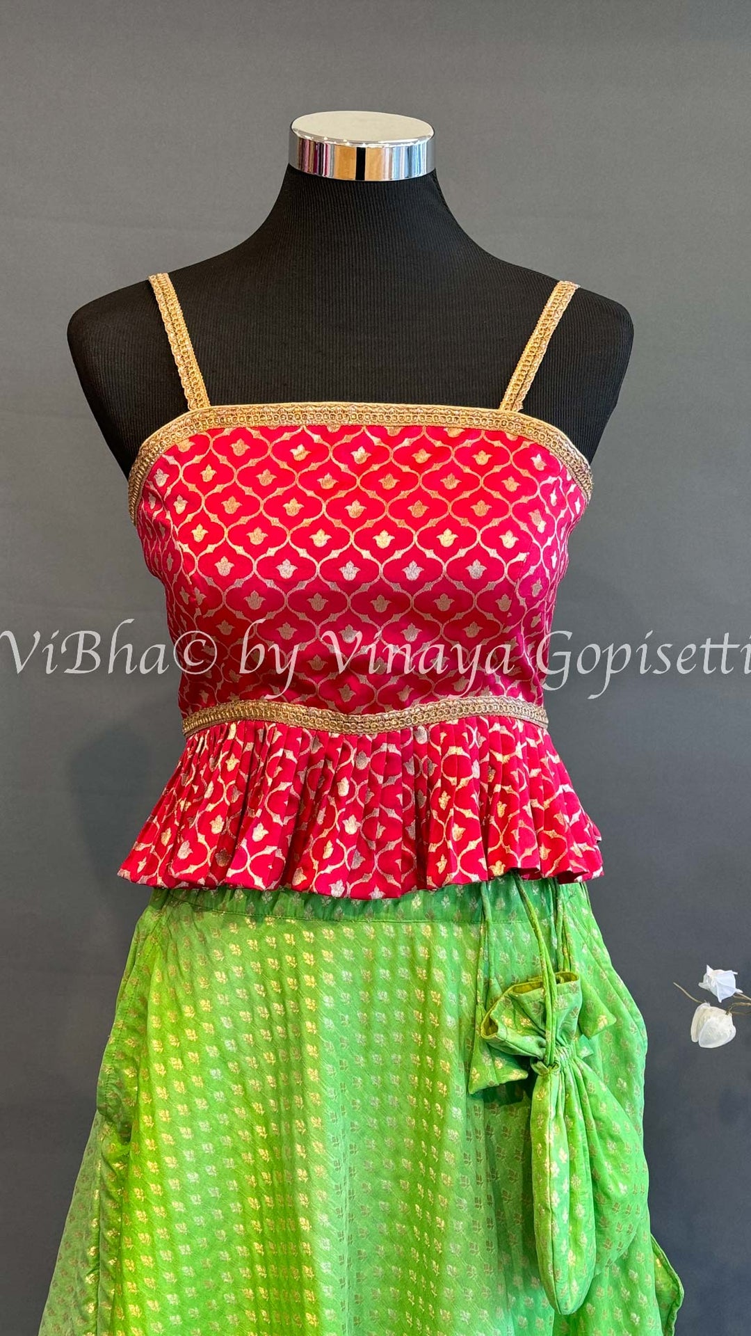 Green and Dark Pink Banarasi Silk Skirt and Crop Top with Potli