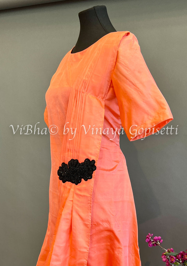 Orange shade Cowl pleated Gown