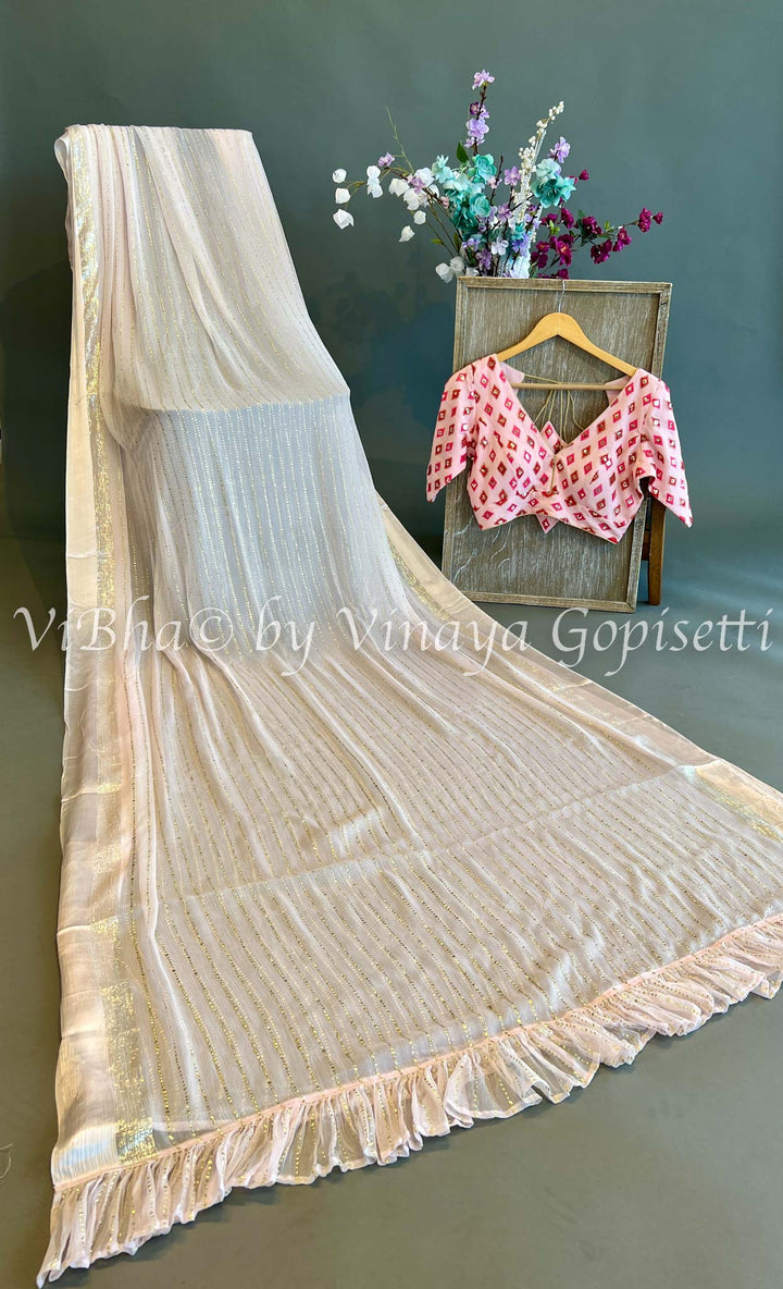 Pastel Pink Sequence Chiffon Saree with Embroidered Blouse