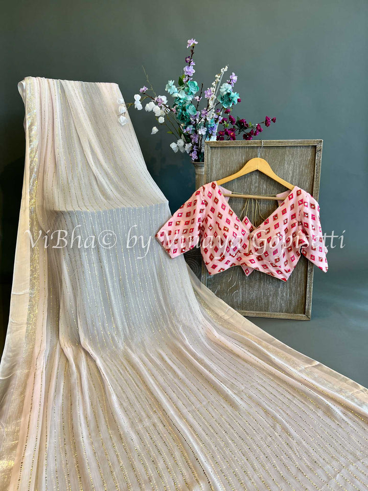 Pastel Pink Sequins Chiffon Saree with Embroidered Blouse