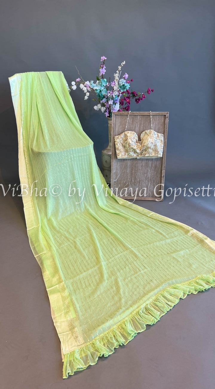 Green Sequins Chiffon Saree with Embroidered Halter Neck Blouse