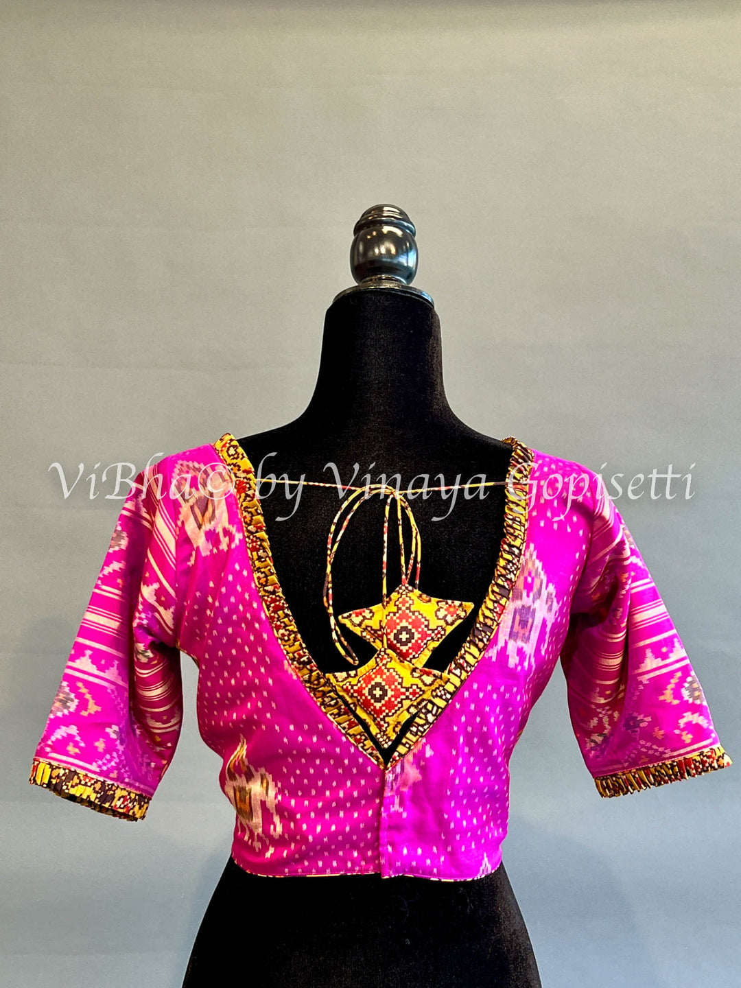 Rani Pink Patola Blouse with Yellow pleated borders