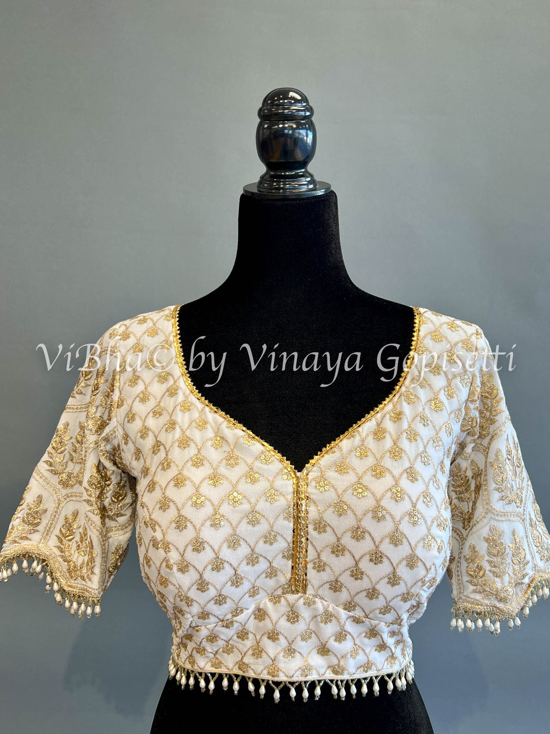 White And Gold Blouse