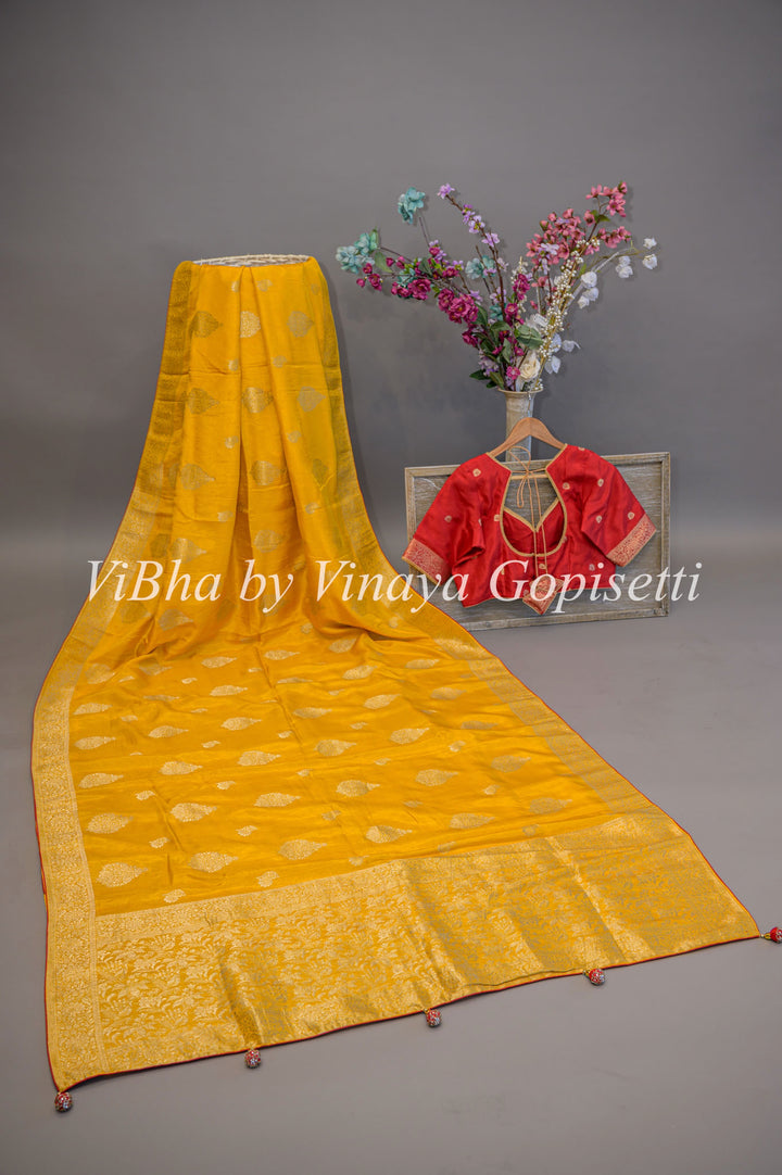 Yellow and Red Banarasi Silk Saree And Blouse
