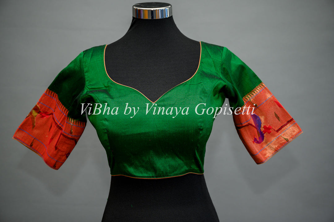 Green Paithani silk saree with Brocket Borders peacock and parrot Pallu and Blouse.