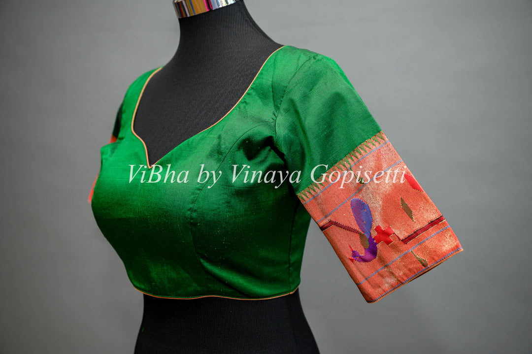 Green Paithani silk saree with Brocket Borders peacock and parrot Pallu and Blouse.