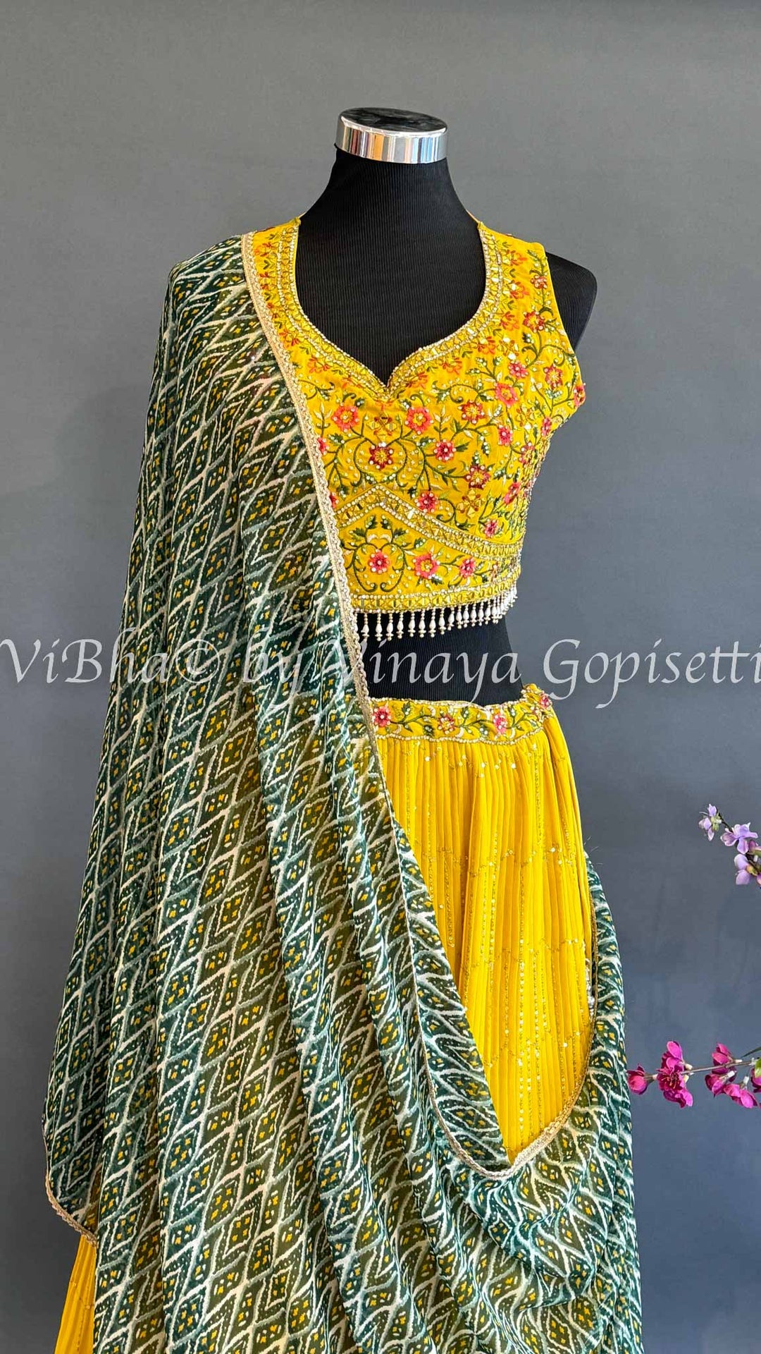 Yellow Lehenga with Embroidered Blouse and Green Bandhej Dupatta