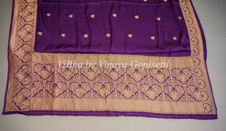 Purple Banarasi Silk Saree And Blouse With Gold Zari Motifs And Borders.