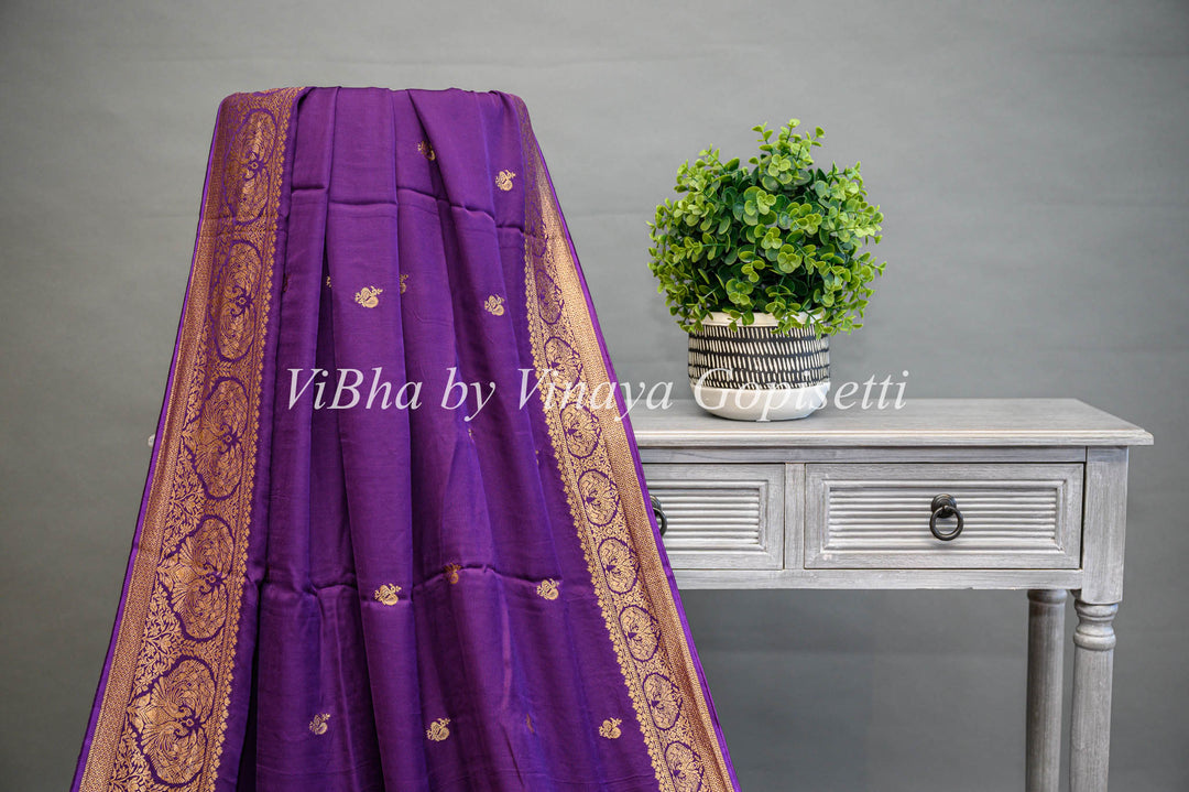 Purple Banarasi Silk Saree And Blouse With Gold Zari Motifs And Borders.