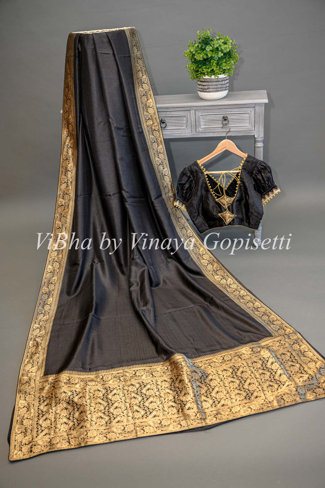 Black Banarasi Silk Saree And Blouse With Gold Zari Borders