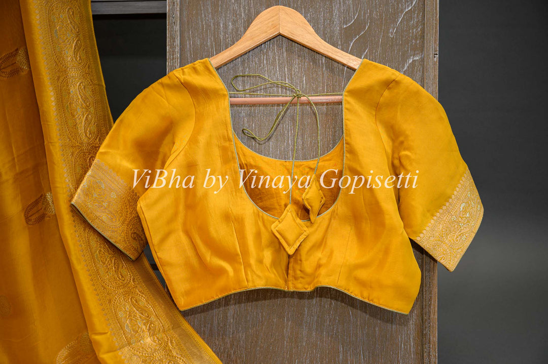 Yellow Banarasi Kora Silk Saree With Gold And Silver Motifs and Borders