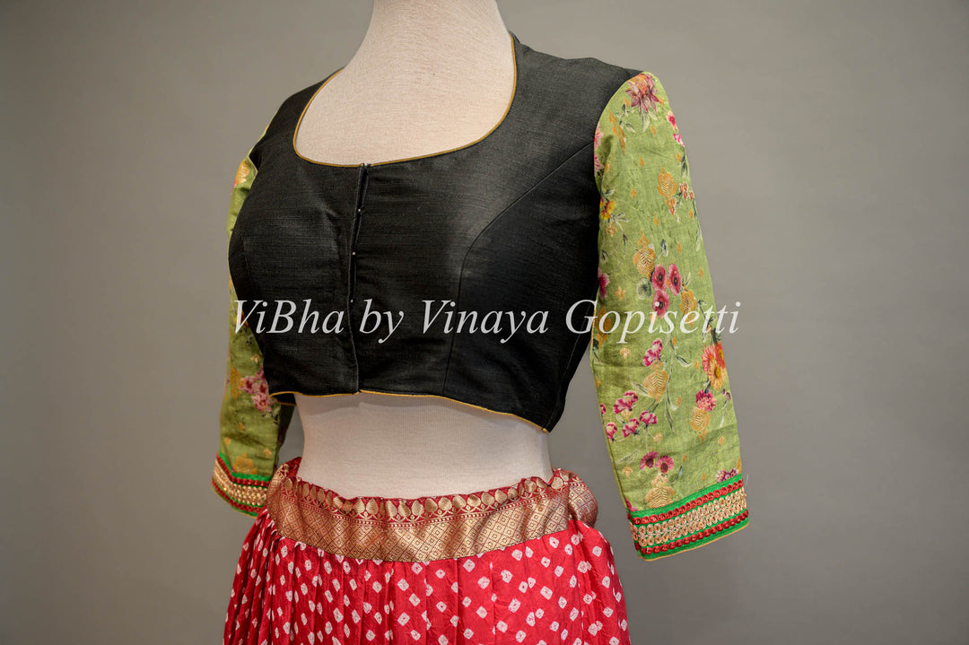 Black hand painted blouse with embroidery and floral sleeves.