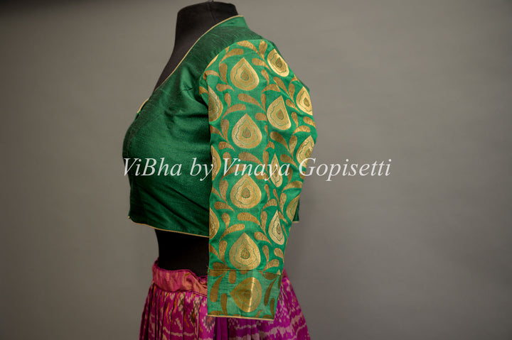 Green hand painted blouse with embroidery and benares brocade sleeves