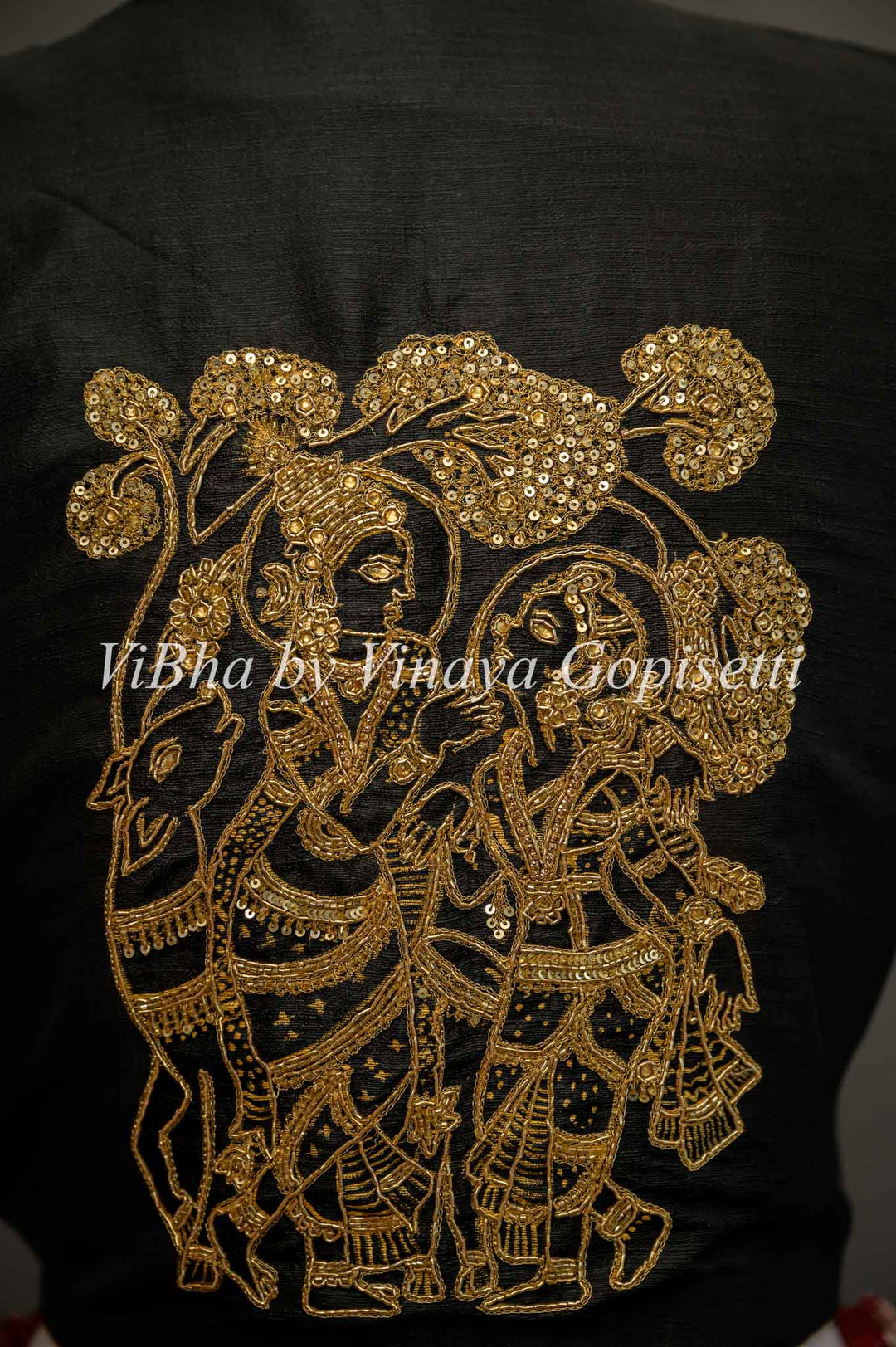 Black hand painted blouse with embroidery and Benares brocade sleeves.