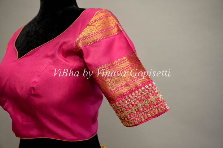 Rani Pink Gadwal Silk Blouse with embroidered sleeves.