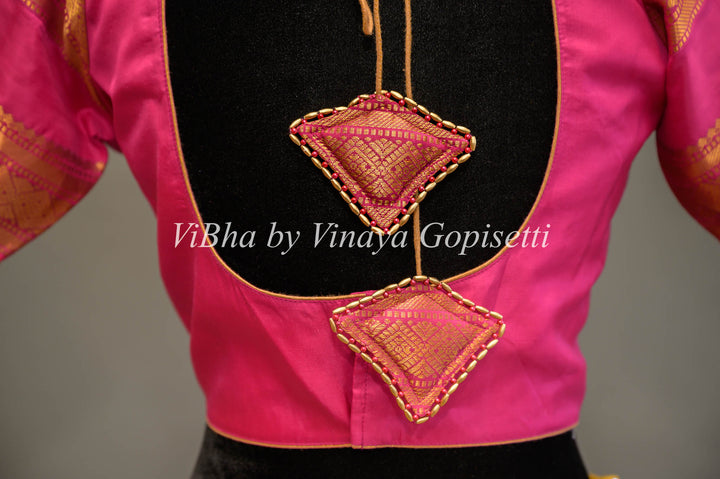 Rani Pink Gadwal Silk Blouse with embroidered sleeves.