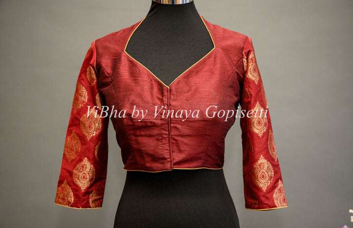 Maroon hand painted blouse with embroidery and Benares brocade sleeves