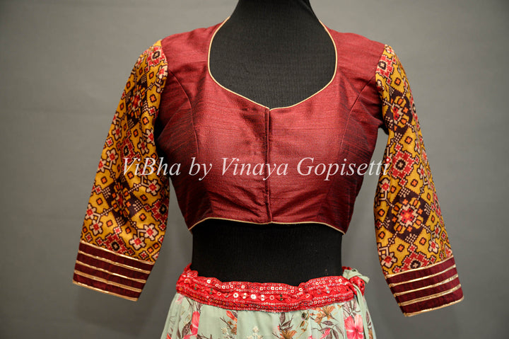 Maroon hand painted blouse with embroidery and patola sleeves