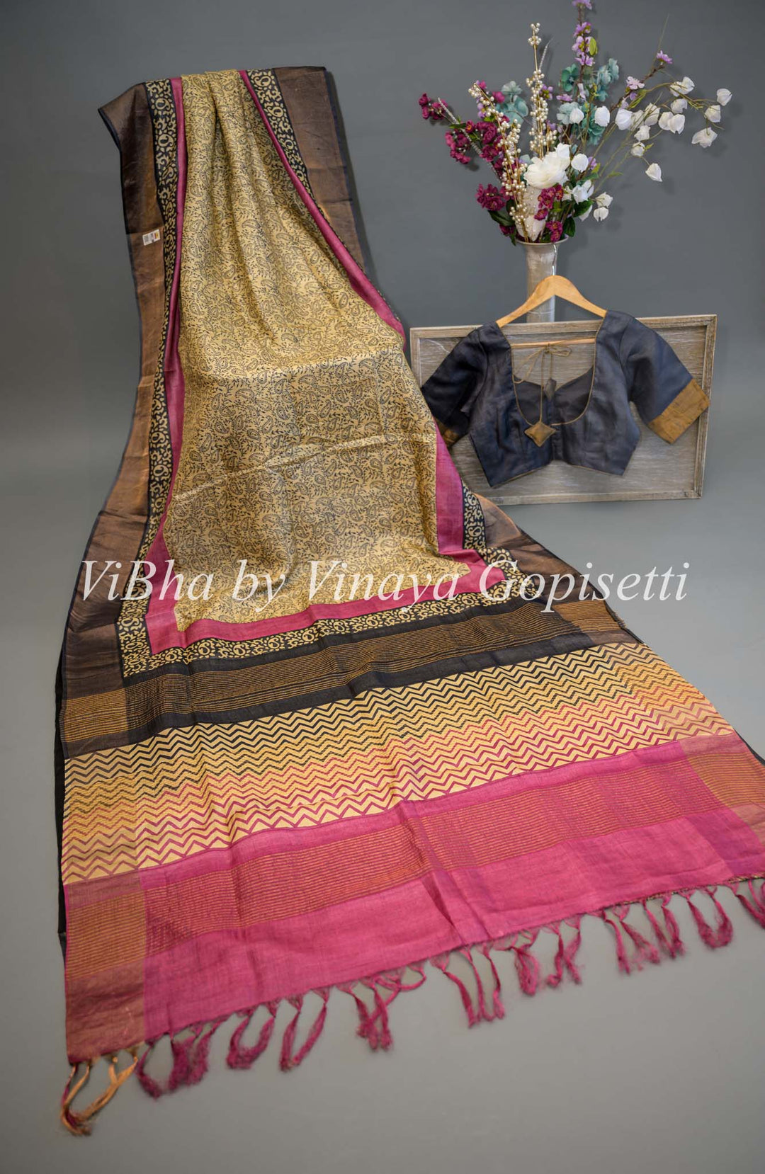 Beige Block Print Saree With Contrast Black and Pink Pallu And Blouse