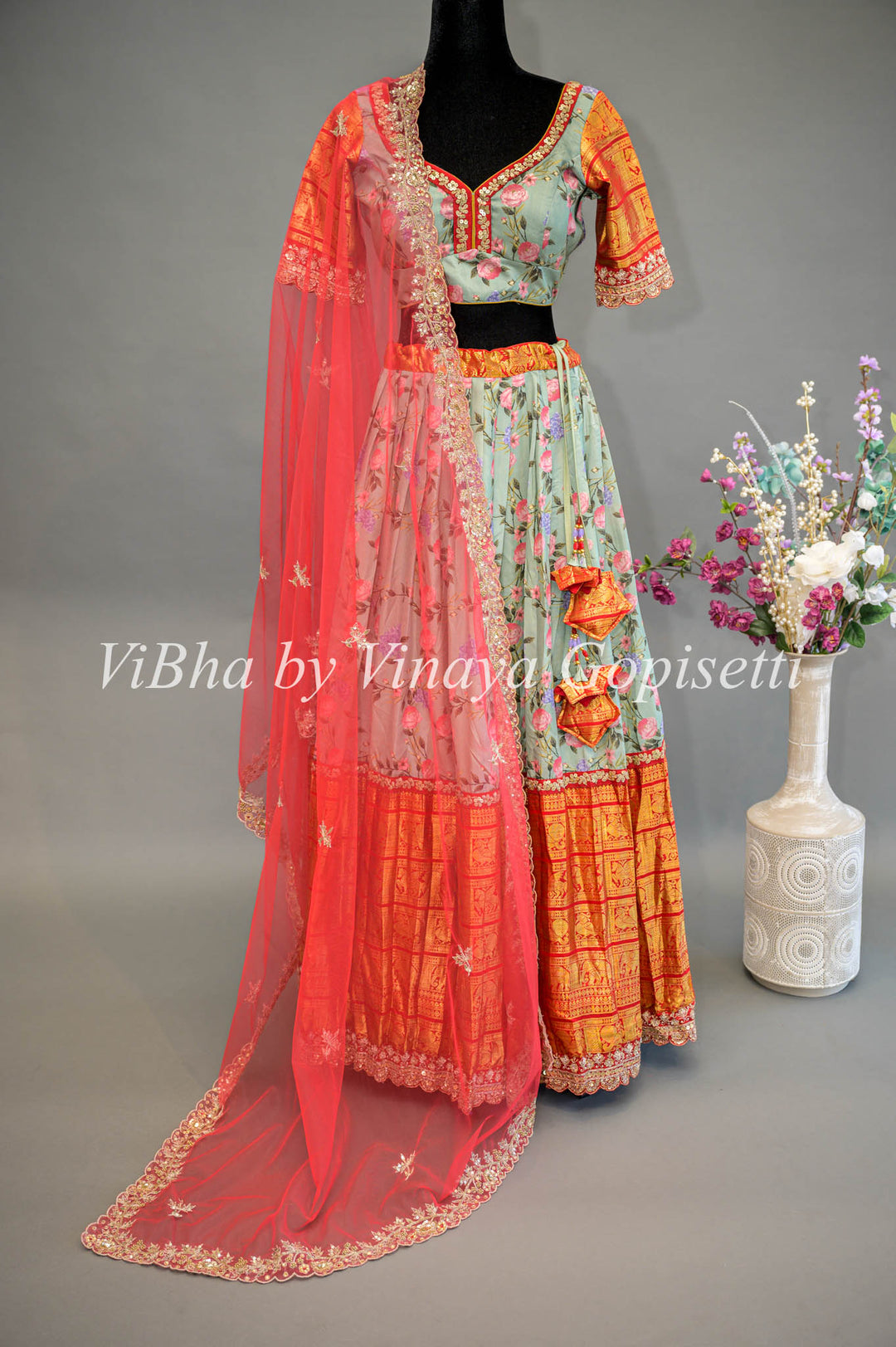 Light Green Floral Kanchi Silk Lehenga With Embroidered Borders and Dupatta