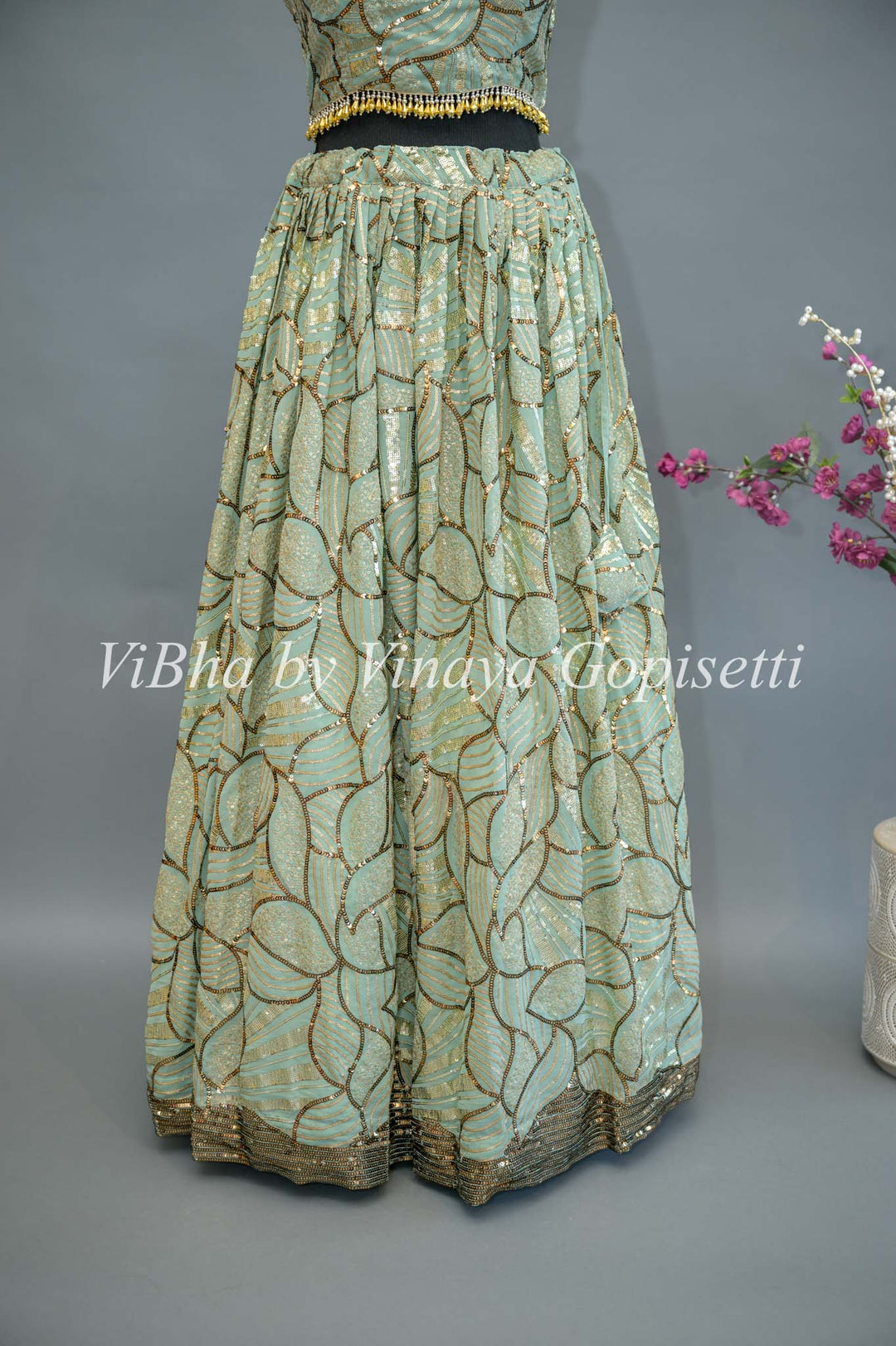 Mint Sequins Lehenga with sleeveless blouse and frilled dupatta