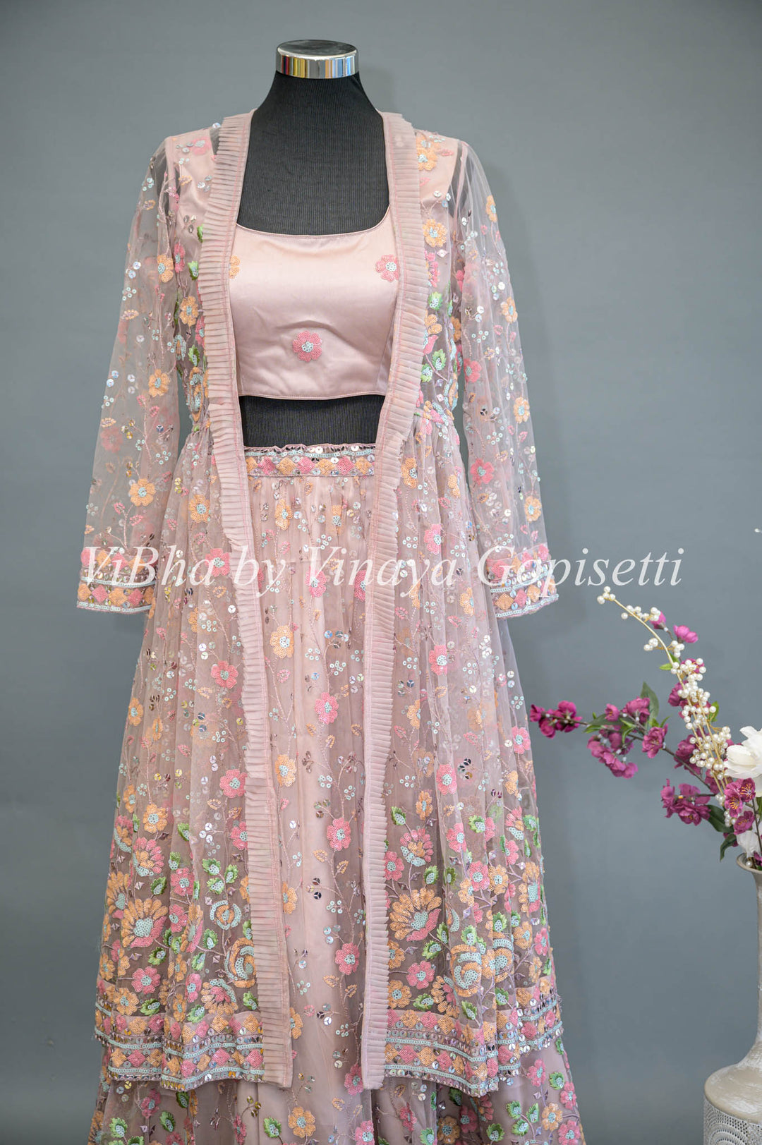 Pastel Pink Net Hand Embroidered Lehenga With Detachable Jacket