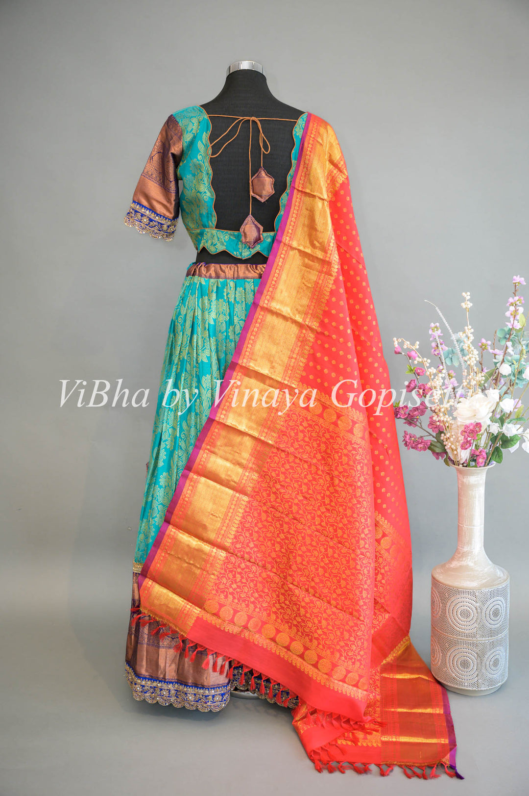 Turquoise and Royal Blue Kanchi Silk Lehenga With Embroidered Borders And Red Kanchi Silk Dupatta