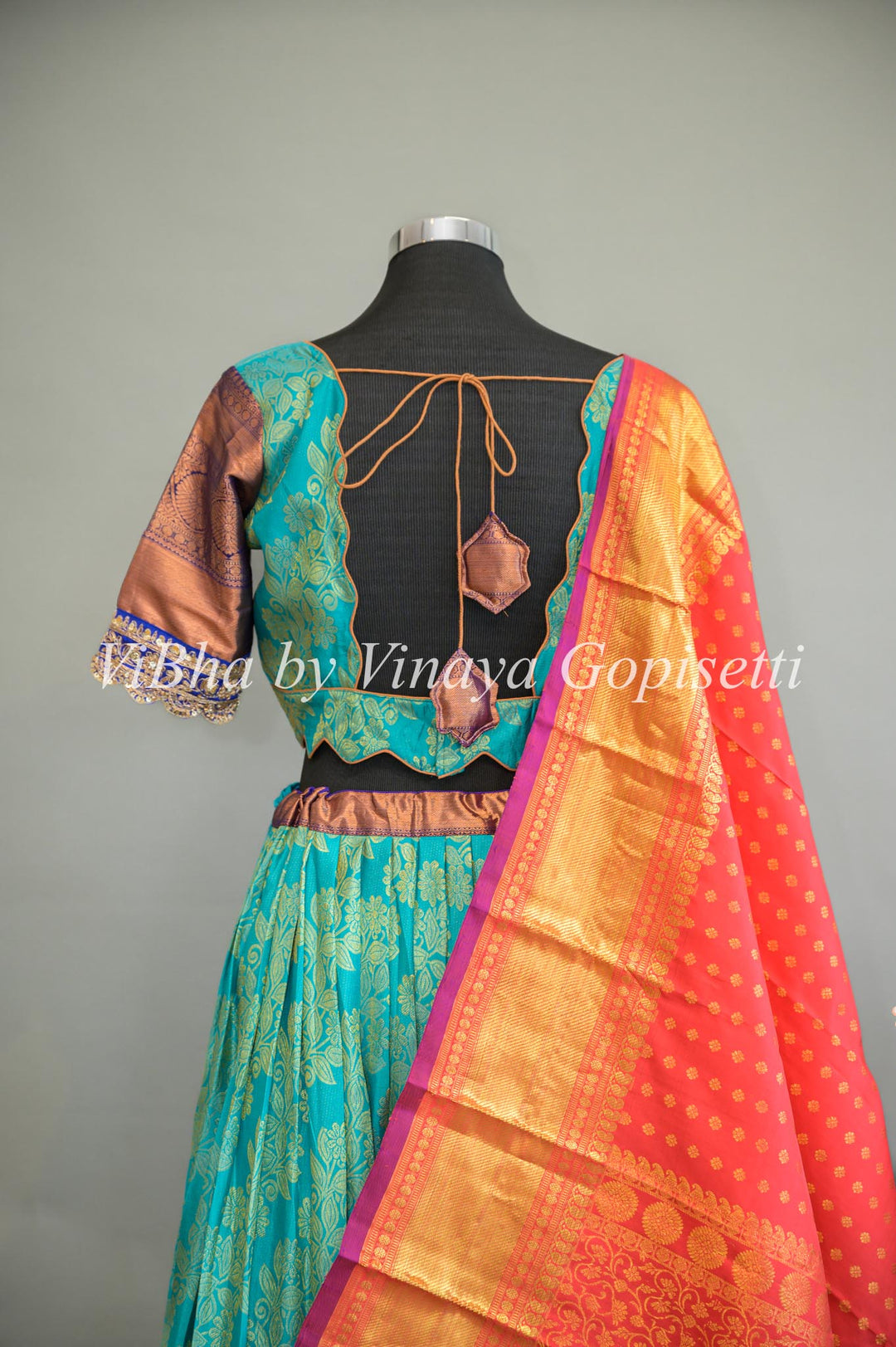 Turquoise and Royal Blue Kanchi Silk Lehenga With Embroidered Borders And Red Kanchi Silk Dupatta