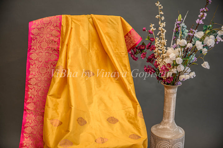 Yellow and Rani Pink Banarasi Katan Silk Saree And Blouse