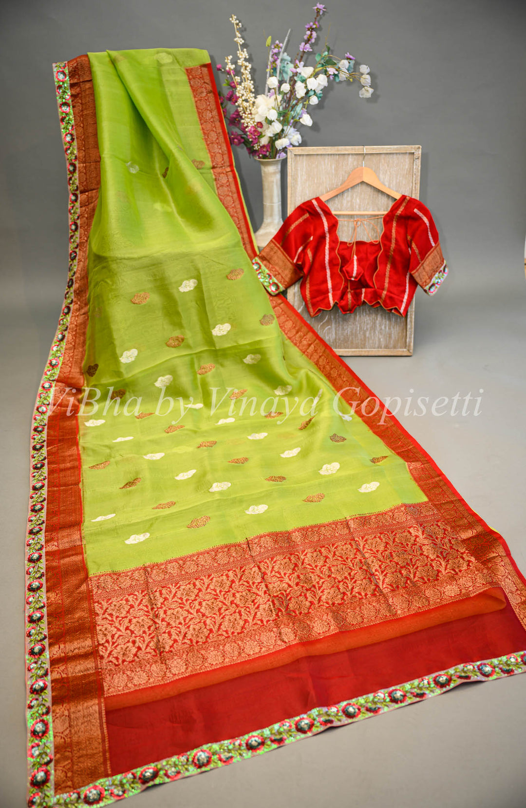 Parrot Green and Red Benares Organza Saree Embellished With Embroidered Borders