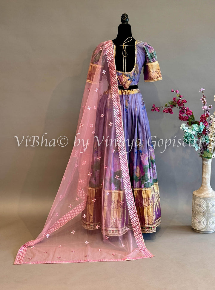 Purple Floral Kanchi Silk Lehenga With Embroidered Borders And Kanchi Kalamkari Dupatta