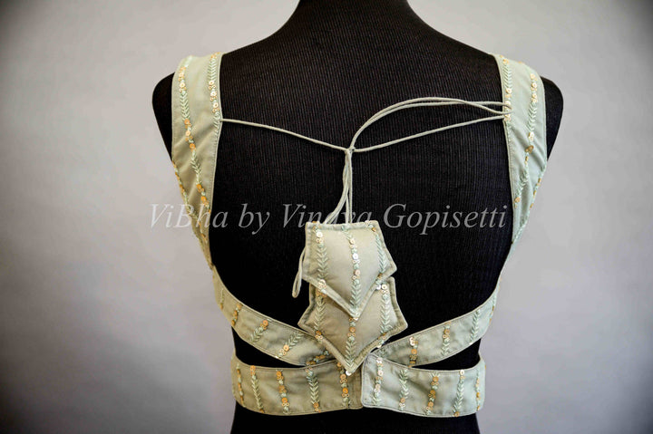 Blouses - Sage Green Sleeveless Embroidered Blouse With V Neckline And Side Cut Outs