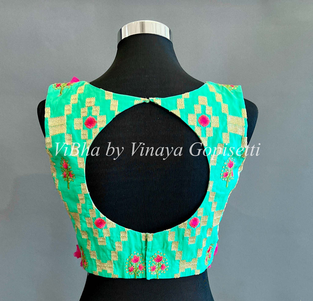 Blouses - Turquoise Green And Pink Frilled Angrakha Cut Blouse