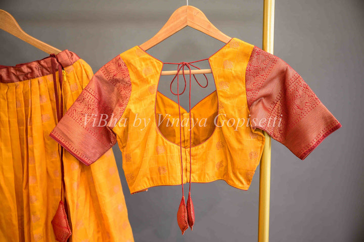 Lehengas - Turmeric Yellow And Maroon Red Kanchi Silk Halfsaree