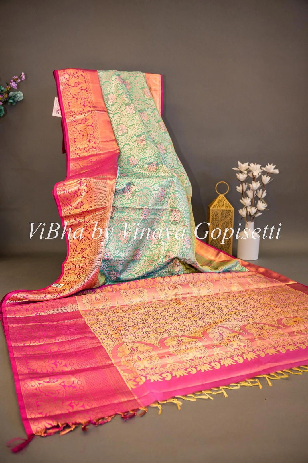 Sarees - Pastel Green And Rani Pink All Over Design Kanchi Silk Saree